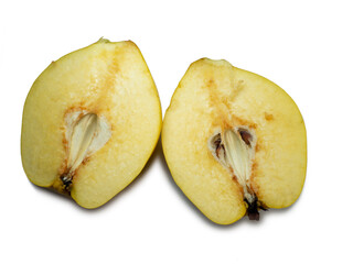 Sliced ​​quince. Juicy fruit on a white background. Ripe useful product. Weathered fruit pulp.