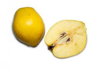 Naklejka na ściany i meble Sliced ​​quince. Juicy fruit on a white background. Ripe useful product. Weathered fruit pulp.