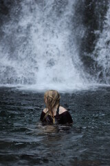 swimming in waterfall