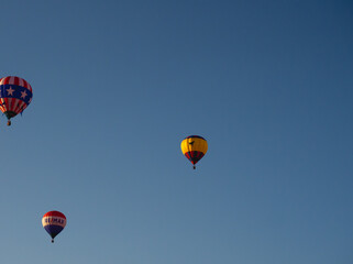 Hot Air Balloon Floating in Clear Blue Sky