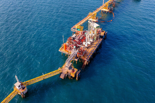 Aerial view of offshore oil and gas rig drilling.