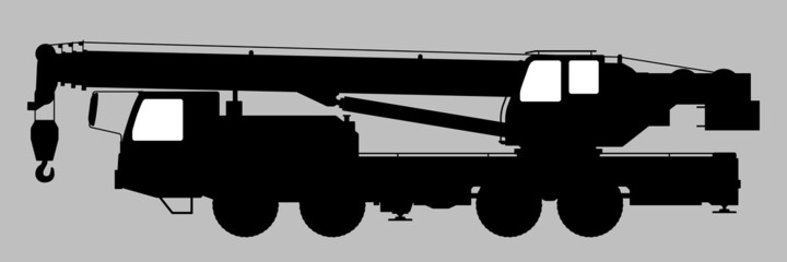 Black and white image of a truck crane.