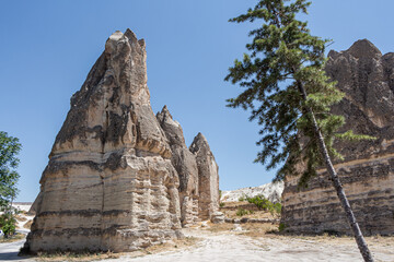 Beautiful view of the valley of love in Cappadocia with mountain peaks in the summer day