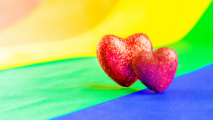 Hearts background homosexual lesbian concept. Two hearts lgbtq, gay, transgender love symbol. LGBT pride day celebration.