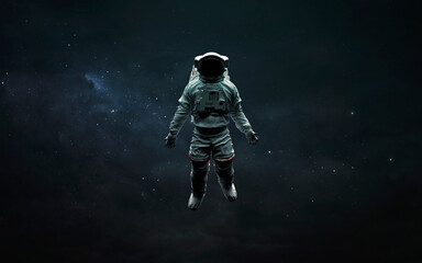 Fototapeta na wymiar Astronaut at spacewalk in deep space. 3D sci-fi art. Elements of image provided by Nasa