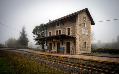 Fototapeta na wymiar Villaverde de Pontones, Spain. December - 16 - 2021. Semi-abandoned state of the villaverde de pontones train station in Cantabria.