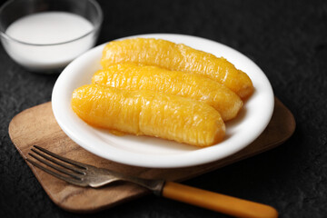 Thai caramelized banana with coconut milk © seksanwangjaisuk