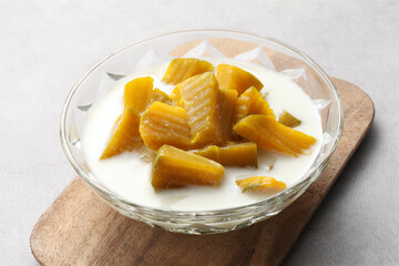 Thai dessert from pumpkin and coconut milk on tray
