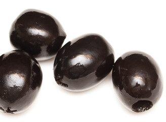 Black olives isolated on a white background.