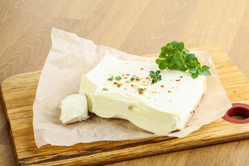 Greek Feta cheese over board