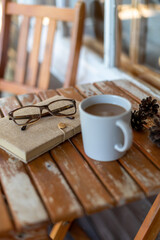 cup of coffee on wooden table