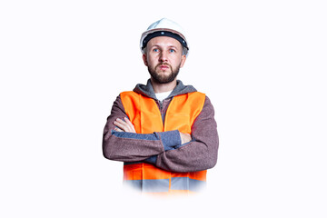 Young male builder in uniform in helmet on light background.