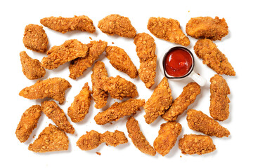 Delicious crispy fried breaded chicken breast strips with ketchup. Isolated on white background. top view