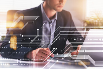 Businessman with laptop, take note, binary and digital lines