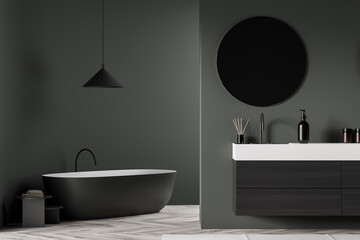 Obraz na płótnie Canvas Dark bathroom interior with sink and mirror, bathtub and lamp
