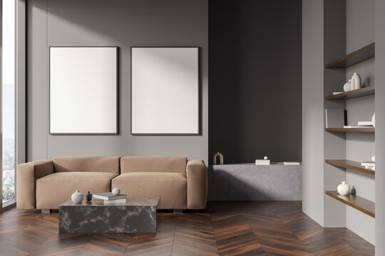 Dark living room interior with two white posters, panoramic window