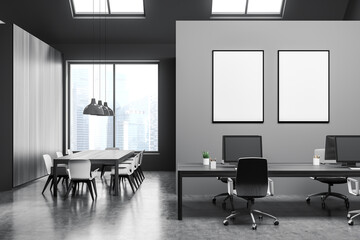 Dark office room interior with two empty white posters