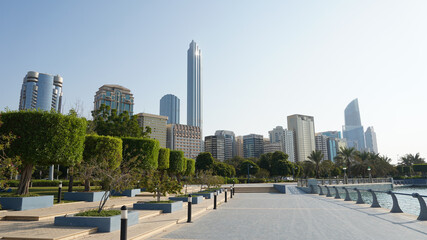 City skyline with big skyscrapers near the beach of Abu Dhabi, United Arab Emirates.