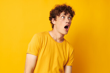 Fototapeta na wymiar Young curly-haired man Youth style studio casual wear isolated background unaltered