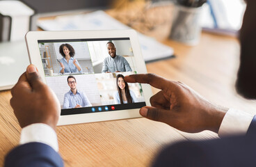 Remote Meeting. Black Businessman Using Digital Tablet For Online Conference With Colleagues