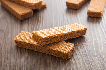 Chocolate wafer biscuit on wooden table