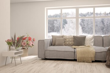 White living room with sofa and winter landscape in window. Scandinavian interior design. 3D illustration