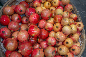Pomegranate fruit, pomegranates in a basket