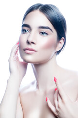 Beautiful model woman with natural make-up hold hands near face. Wet blonde hair, clean skin, blue eyes. White background. Skincare facial treatment concept