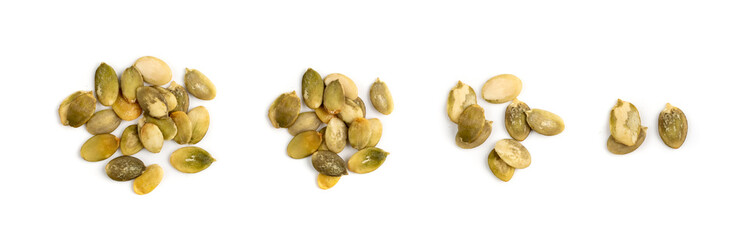 Pumpkin seeds pile isolated on white background top view