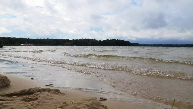 Surfing Waves on Lake Sand Beach.