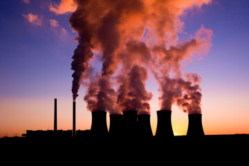 Fototapeta na wymiar coal fired power station and Combined cycle power plant at sunset, Pocerady, Czech republic