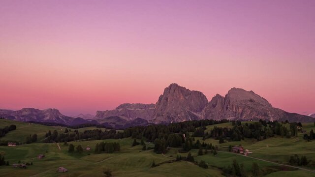 Aerial drone sunset cinematic view of Alpe di Siusi, Dolomites and Alpine meadow mountain Plateau in Italy.Beautiful landscape scenery at idyllic Seiser Alm valley in South Tyrol