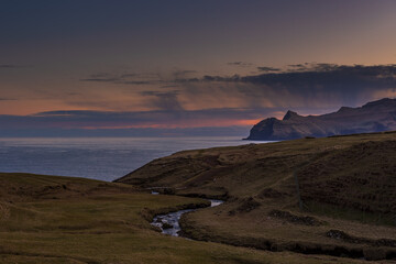 Sunset over a volcanic archipelago, Faroe Islands.