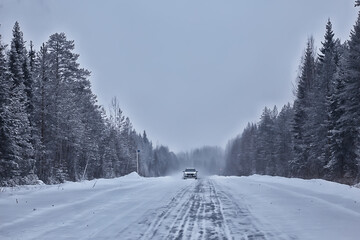 winter highway snowfall background fog poor visibility