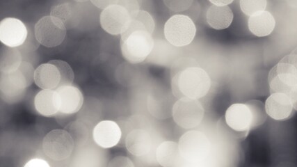 The illuminated white bokeh image can be used as a background illustration or add text.