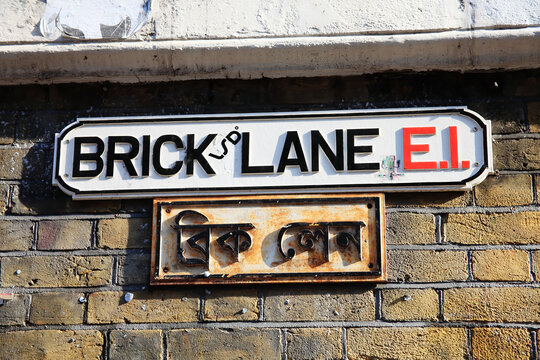 Brick Lane road sign in Whitechapel Tower Hamlets London England UK which is commonly known as Banglatown and is popular for its street market traders, stock photo image