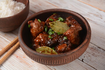 Homemade Filipino Adobo Pork with White Rice. Close-up shot of Filipino style adobo.