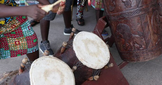 African traditional wooden drums Accra Ghana. Traditional cultural music instruments, drums, for dancing and entertainment. Culture African celebration demonstration. Typical native cultural.