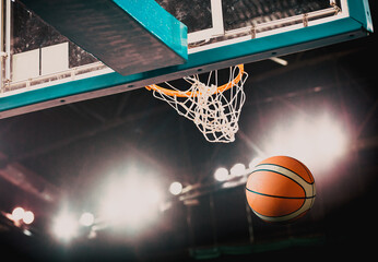 basketball game ball in hoop