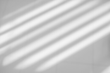 Gray window shadow and light blur abstract background on white wall, shadow overlay effect