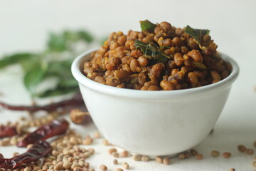 Boiled red cowpea beans stir fried with shallots and garlic. Popular side dish for meals in Kerala...