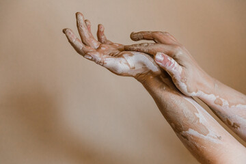 Female ceramist hands sculpt clay dishes
