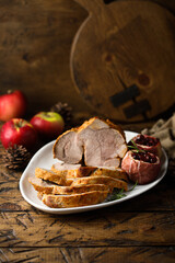 Homemade roasted pork with apples and cranberry