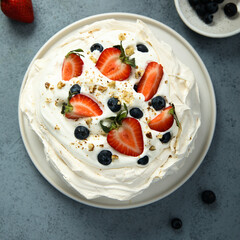 Pavlova meringue dessert with fresh berries
