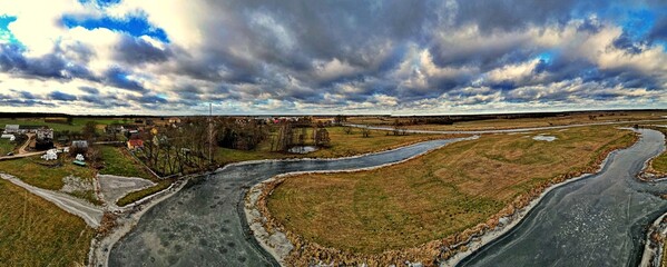 Panorama.View of the frozen Narew River and its surroundings.