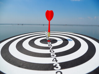 success target business darts red target in the center background is a large sea