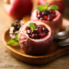 Baked apples with cranberry and spices
