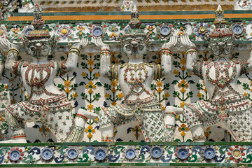 Bangkok, Thailand - January 2022: Detail of a statue in the Wat Arun Buddhist temple located on the banks of the Chao Phraya River on January 16, 2022 in Bangkok, Thailand.