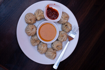 hot momo with 2 types of pickle