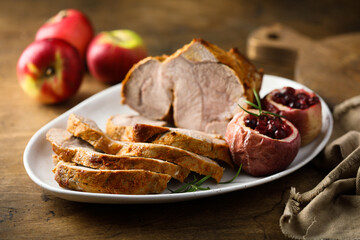 Homemade roasted pork with apples and cranberry